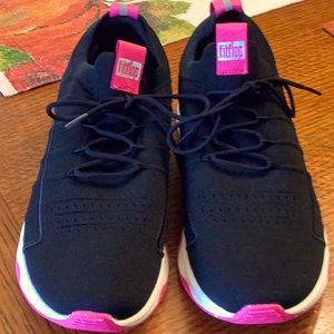 Fitflop black with some pink tennis shoes.